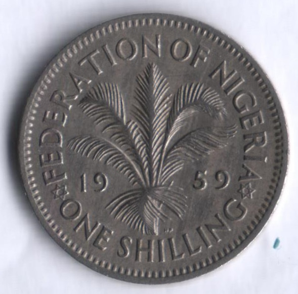 Монета 1 шиллинг. 1959 год, Нигерия (колония Великобритании).