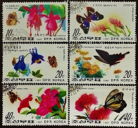 Набор почтовых марок (6 шт.). "Бабочки и цветы". 1987 год, КНДР.