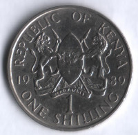 Монета 1 шиллинг. 1989 год, Кения.