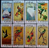 Набор марок (8 шт.). "Экзотические птицы: искусство Хиросигэ и Хокусая". 1971 год, Аджман.