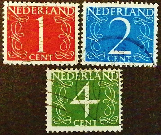 Набор марок (3 шт.). "Цифры 1946-1957". 1946 год, Нидерланды.