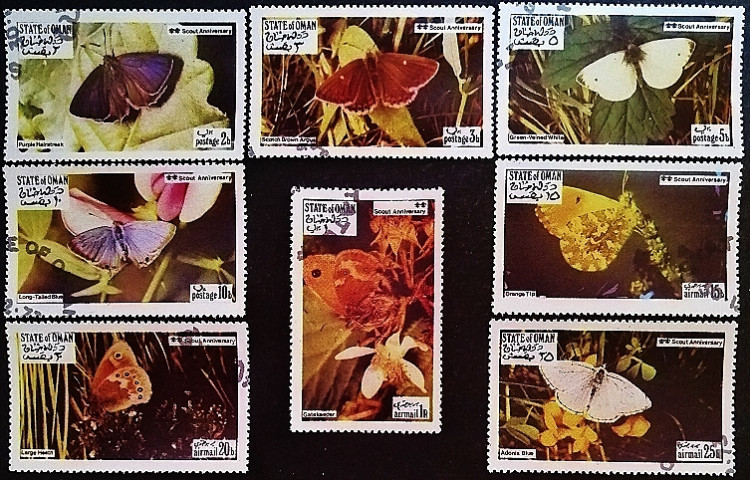 Набор марок (8 шт.). "Бабочки". 1973 год, Государство Оман.