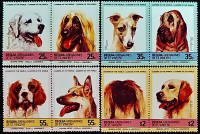 Набор марок (8 шт.). "Собаки". 1985 год, Сент-Винсент и Гренадины (остров Бекия).