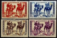 Набор марок (4 шт.). "Воины на верблюдах". 1938 год, Мавритания.