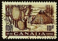 Почтовая марка. "Индейцы, высушивающие шкуры". 1950 год, Канада.