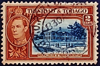 Почтовая марка (2 c.). "Король Георг VI и пейзажи". 1938 год, Тринидад и Тобаго.