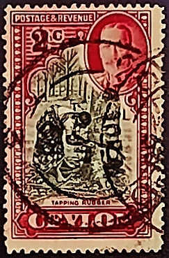 Почтовая марка (2 c.). "Король Георг V и пейзажи". 1935 год, Цейлон.