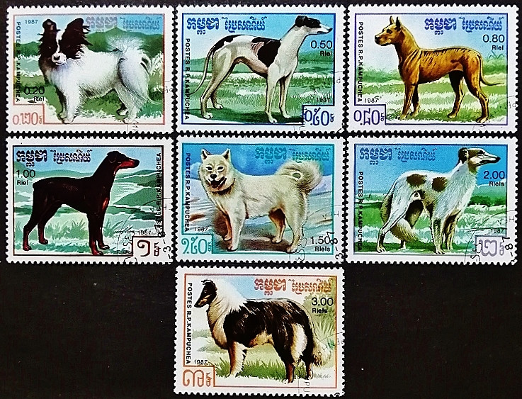 Набор почтовых марок (7 шт.). "Породы собак". 1987 год, Камбоджа.