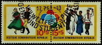 Набор почтовых марок в сцепке (2 шт.). "Международный фестиваль молодежи и студентов, Хельсинки". 1962 год, ГДР.