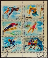 Набор марок (6 шт.) с блоком. "Зимние Олимпийские игры 1972 года, Саппоро". 1970 год, Рас-Аль-Хайма (ОАЭ).