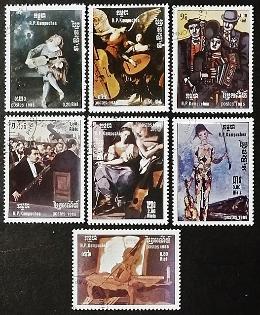 Набор почтовых марок (7 шт.) с блоком. "Международный год музыки". 1985 год, Камбоджа.