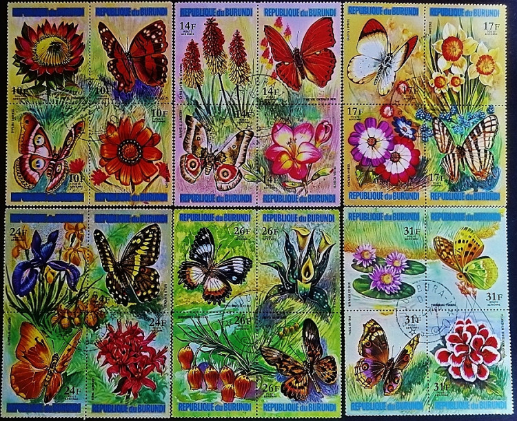 Набор почтовых марок (24 шт.). "Цветы и бабочки (II)". 1973 год, Бурунди. Набор почтовых марок (24 шт.). "Цветы и бабочки (II)". 1973 год, Бурунди.