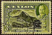 Почтовая марка (3 c.). "Король Георг V и пейзажи". 1935 год, Цейлон.