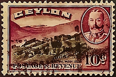 Почтовая марка (10 c.). "Король Георг V и пейзажи". 1935 год, Цейлон.