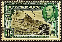 Почтовая марка (3 c.). "Король Георг VI и пейзажи". 1938 год, Цейлон.