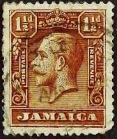 Почтовая марка (1⅟₂ p.). "Король Георг V". 1929 год, Ямайка.