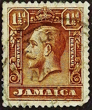 Почтовая марка (1⅟₂ p.). "Король Георг V". 1929 год, Ямайка.