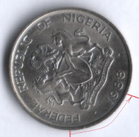 Монета 10 кобо. 1988 год, Нигерия. Брак. Поворот на 75⁰.