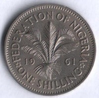Монета 1 шиллинг. 1961 год, Нигерия (колония Великобритании).