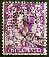 Марка (перфин) "MB". "Король Георг V". 1912 год, Великобритания.