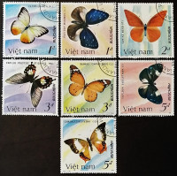 Набор почтовых марок (7 шт.). "Бабочки-1986". 1987 год, Вьетнам.
