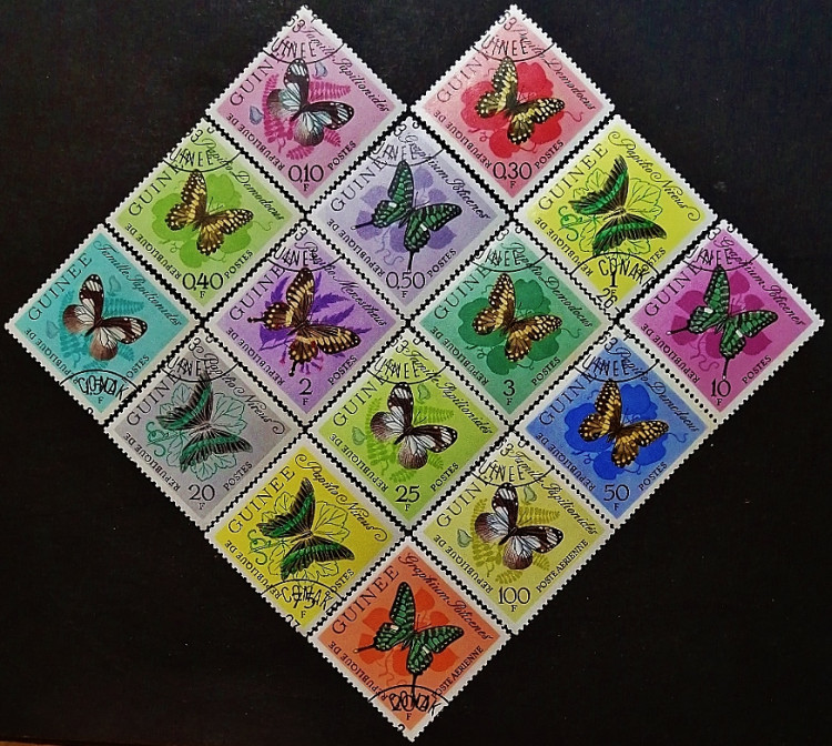 Набор почтовых марок (15 шт.). "Бабочки". 1963 год, Гвинея.