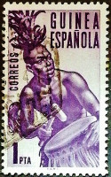 Почтовая марка (1 ps.). "Абориген с бубном". 1953 год, Испанская Гвинея.