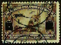 Почтовая марка. "Раненый сербский солдат (надпечатка)". 1922 год, Королевство сербов, хорватов и словенцев.