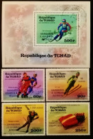 Набор почтовых марок  (4 шт.) с блоком. "Зимние Олимпийские игры 1976 - Инсбрук (Медали)". 1976 год, ЧАД.