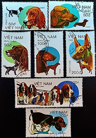 Набор почтовых марок (7 шт.). "Собаки". 1989 год, Вьетнам.