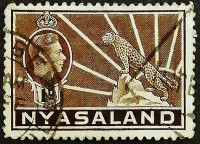 Почтовая марка (1 d.). "Георг VI и Леопард". 1938 год, Ньясаленд.